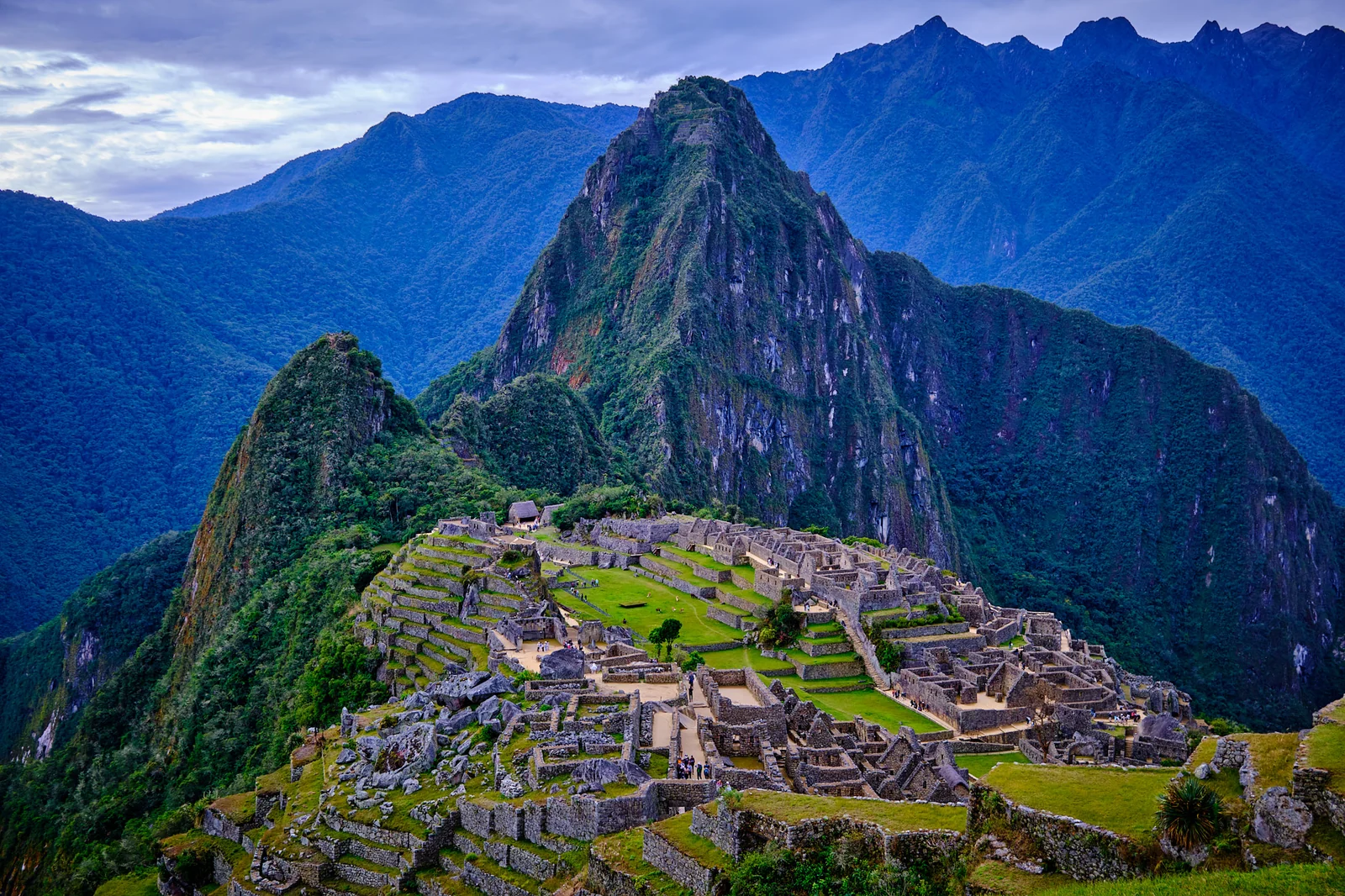 Classic view of Machu Picchu at first light, with Huayna Picchu rising behind the citadel