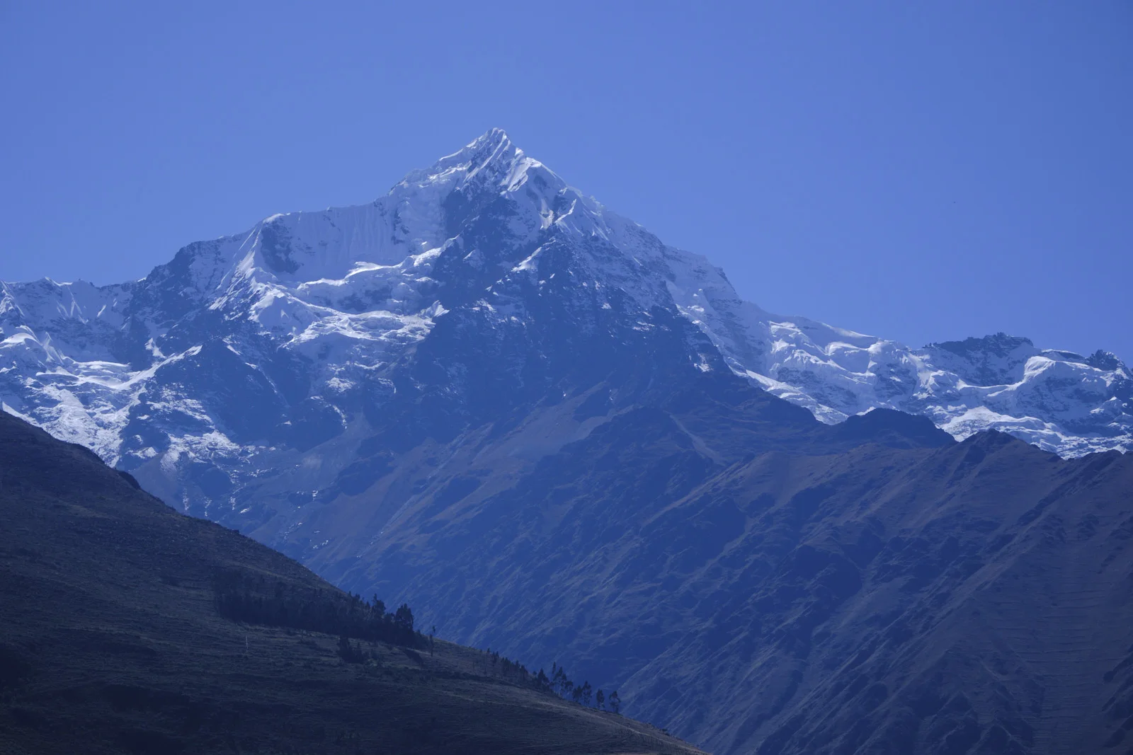 Nevado Veronica (Wakay Willka) from the lower Inca Trail, a glaciated pyramid above dry ridges