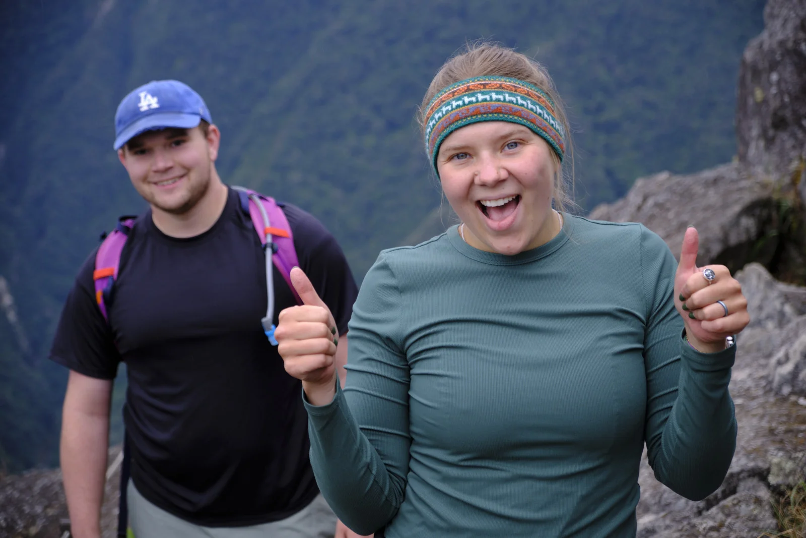Rocky Huayna Picchu trail with forested canyon slopes behind