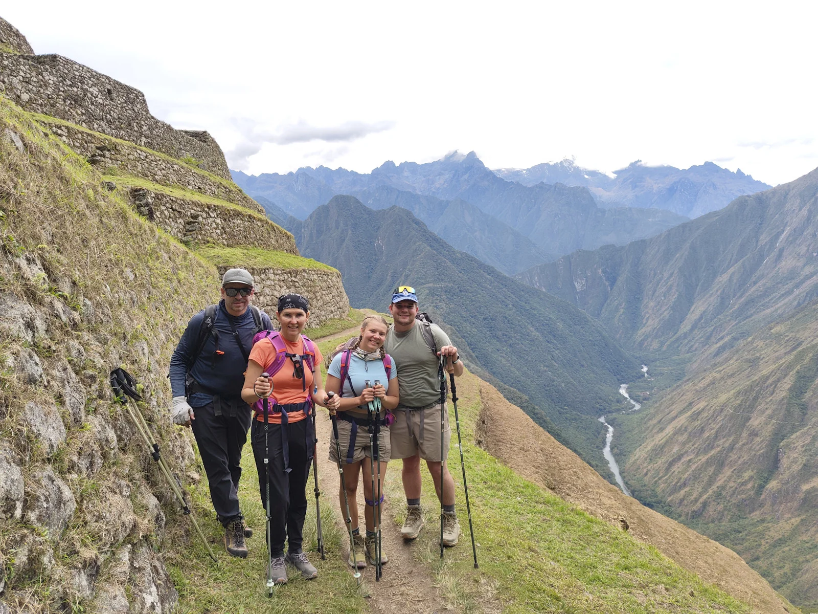 Intipata’s terrace path, stacked stone walls to the left and the Urubamba River in the canyon below