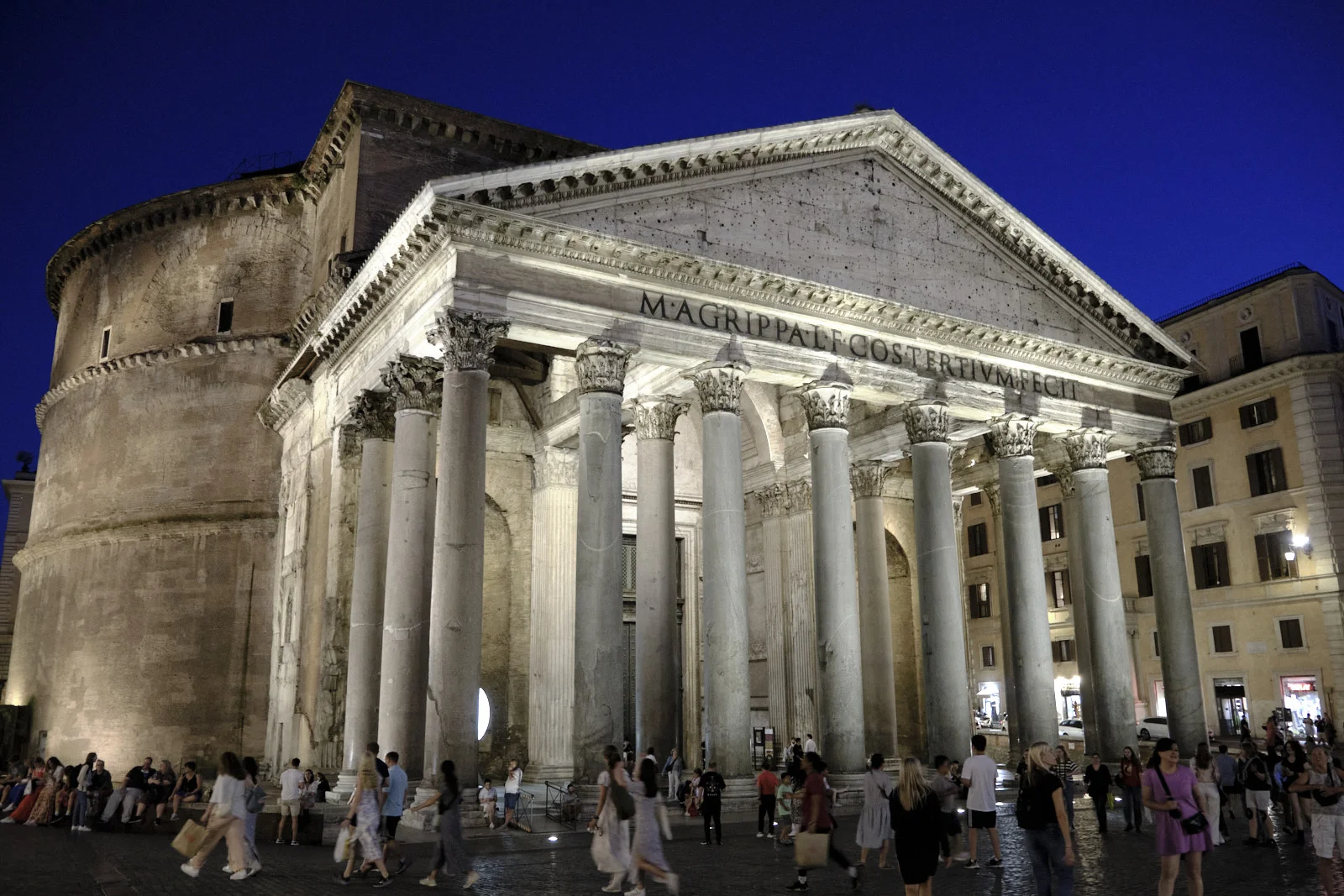 The Pantheon in Rome at night with its Corinthian portico and Agrippa inscription