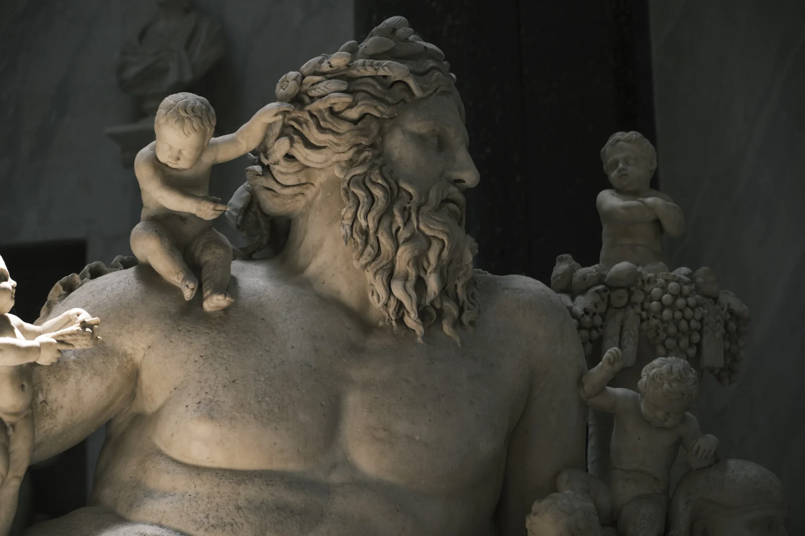 Marble Nile river god with putti climbing in his hair