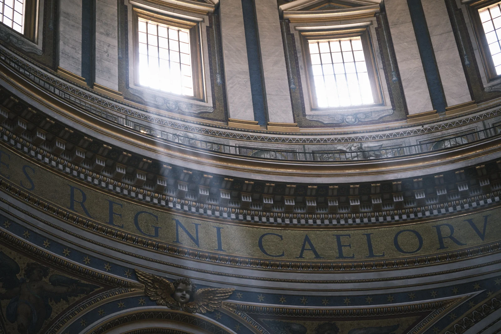 Inscription REGNI CAELORUM inside the dome of St. Peter’s