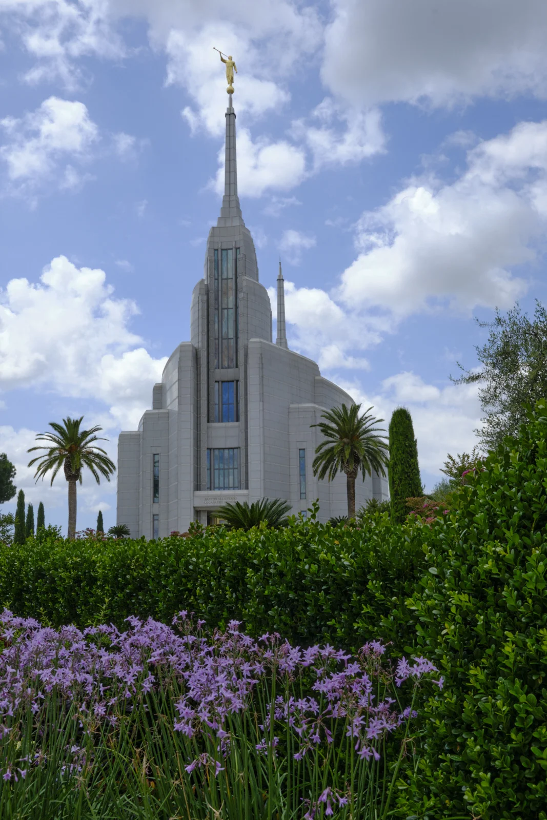 Rome Italy Temple above hedges and purple flowers