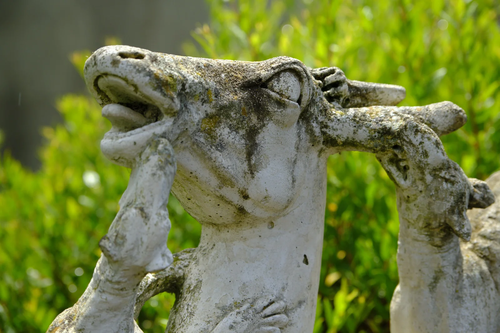 Stone statue of a goat in a garden at Herculaneum