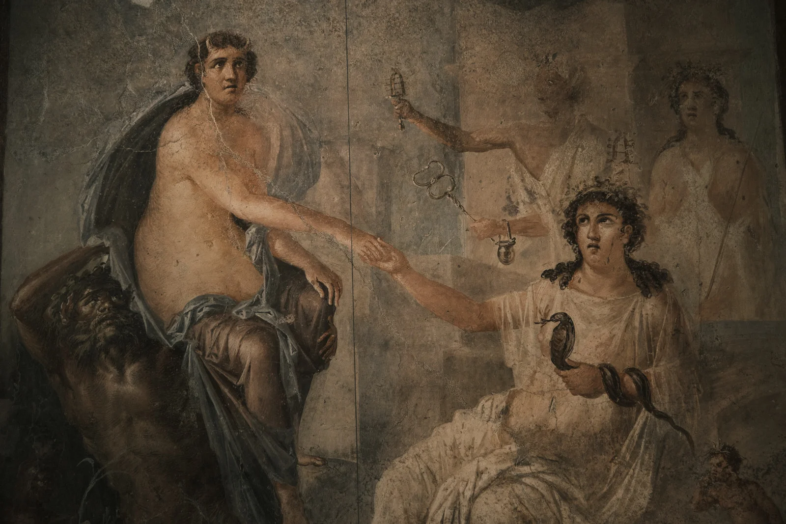 Roman fresco of a satyr and a woman holding a snake, Naples museum