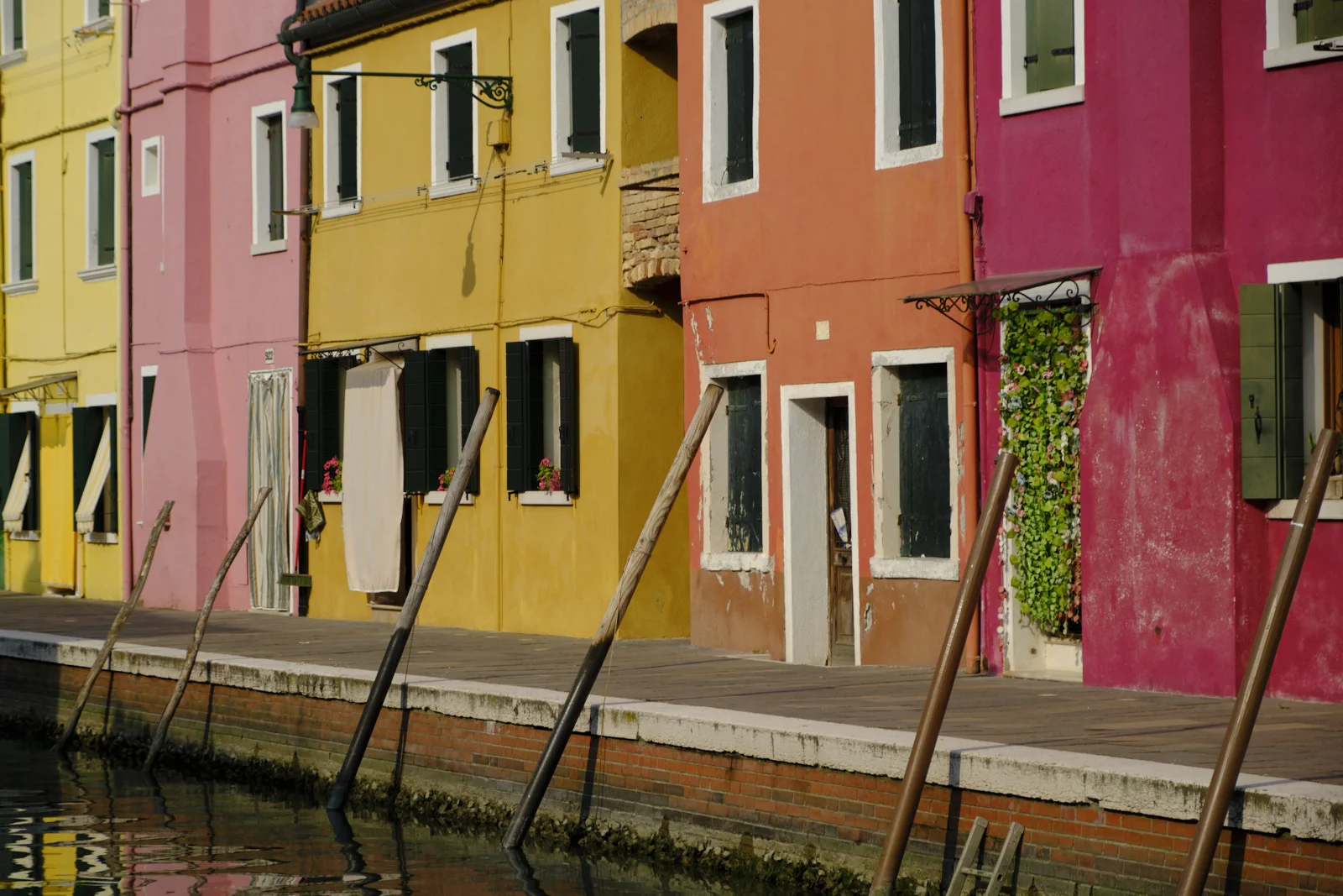 Painted houses along a Burano canal