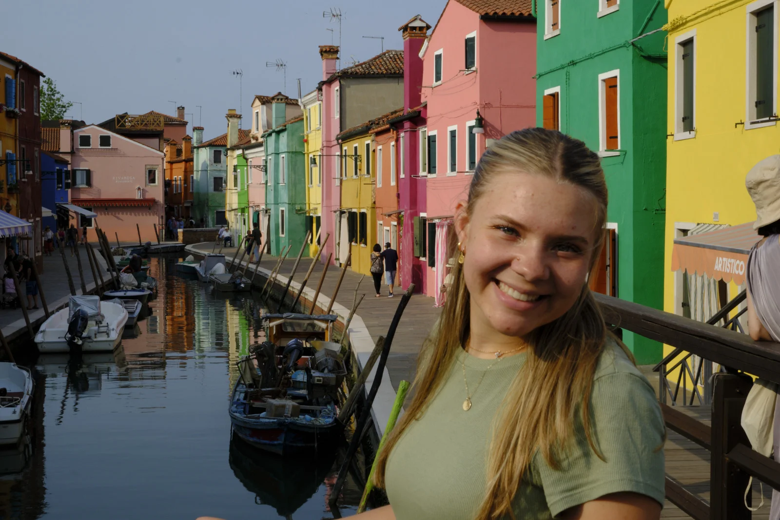 Portrait on a Burano canal with colored houses