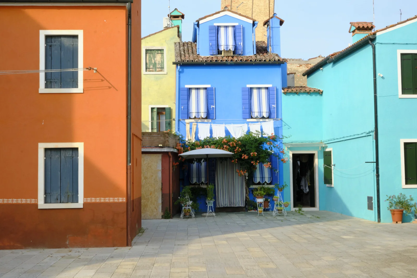 Small piazza of brightly painted houses in Burano