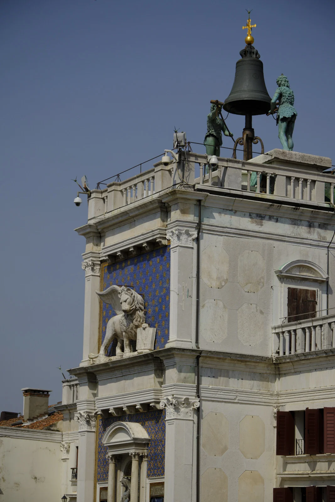 Clock Tower of St. Mark with the winged lion and the two bronze Moors