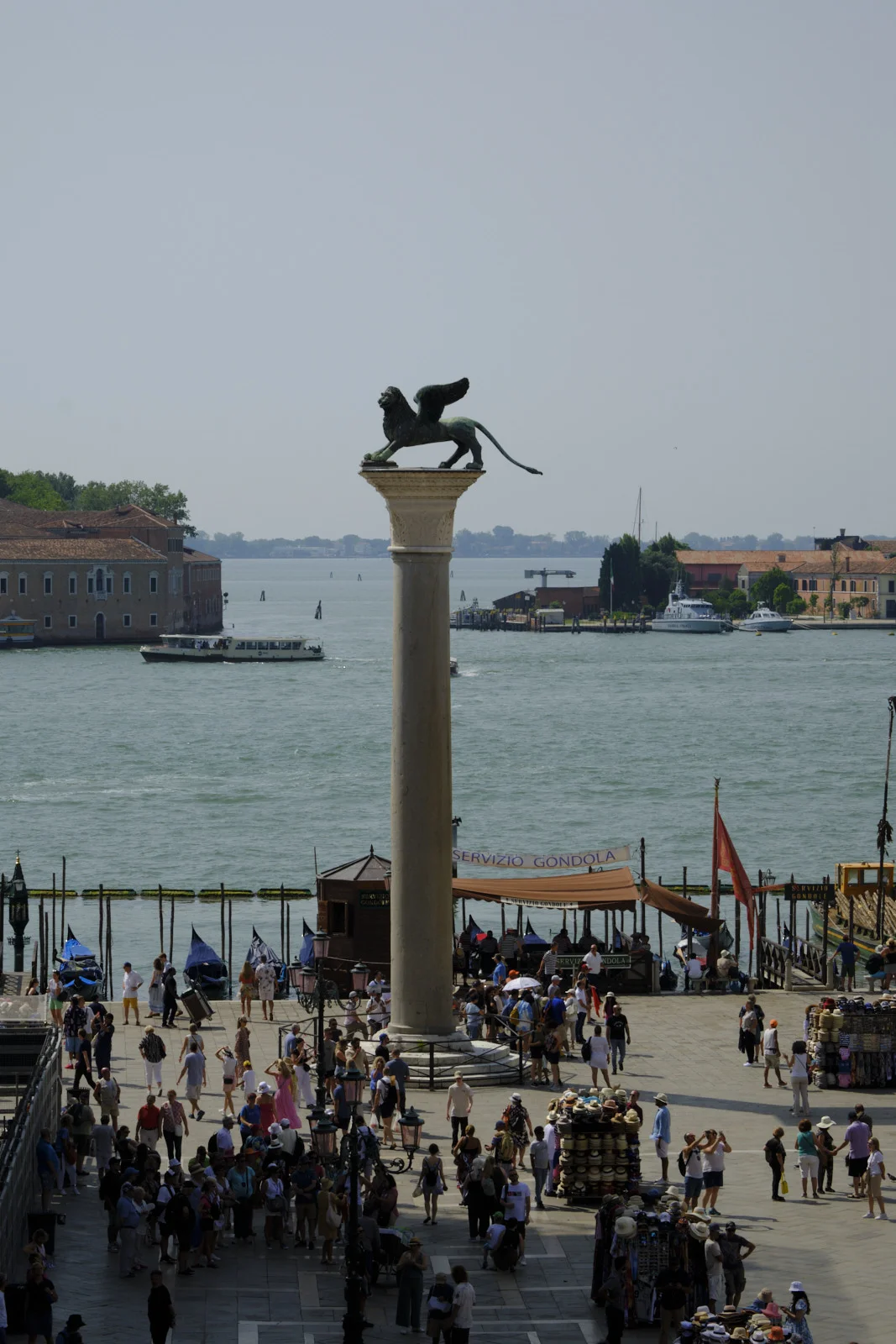 Column of the Lion in the Piazzetta San Marco, lagoon and gondola stand below