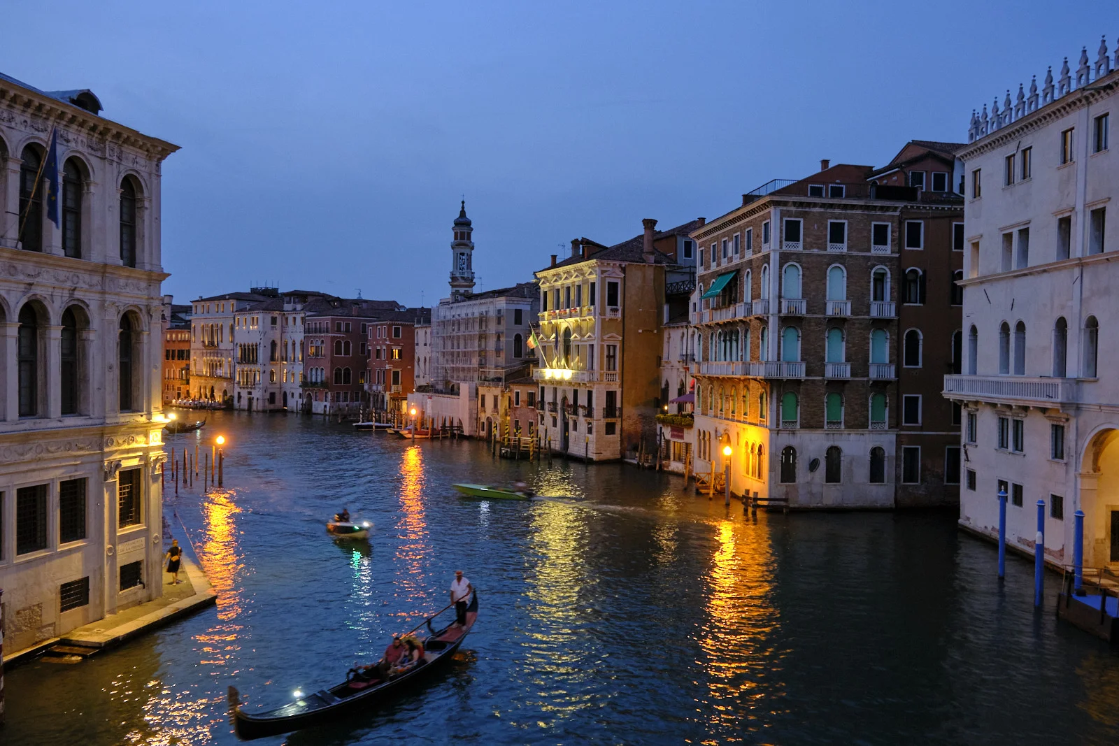 Grand Canal at dusk from the Rialto Bridge with a gondola