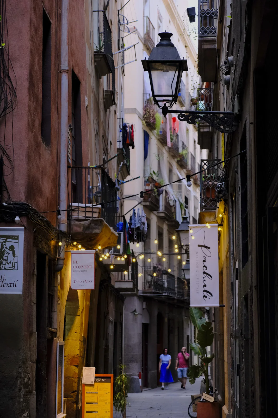 Carrer del Brosolí in Barcelona, with the sign for the restaurant El Convent.