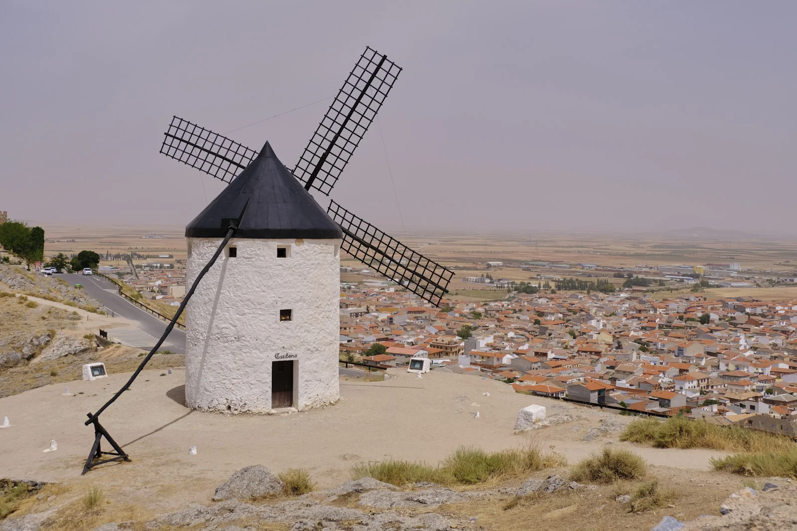The windmill Cardeño on the ridge above the town of Consuegra.