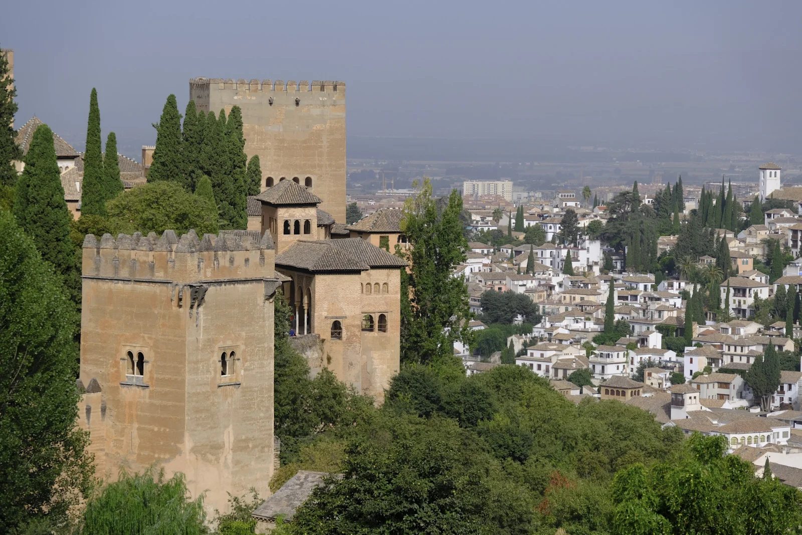 Towers of the Alhambra above the houses of the Albaicín in Granada.