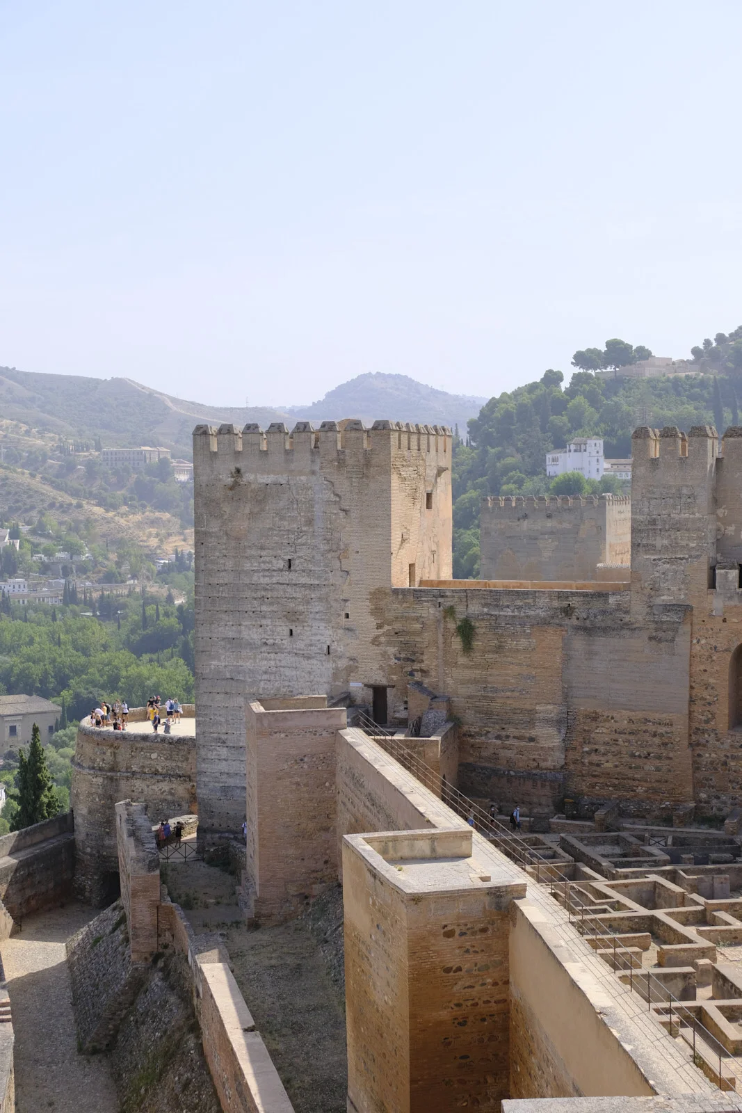 Torre del Homenaje and Torre Quebrada inside the Alcazaba in Granada, above the ruins of the military quarter.