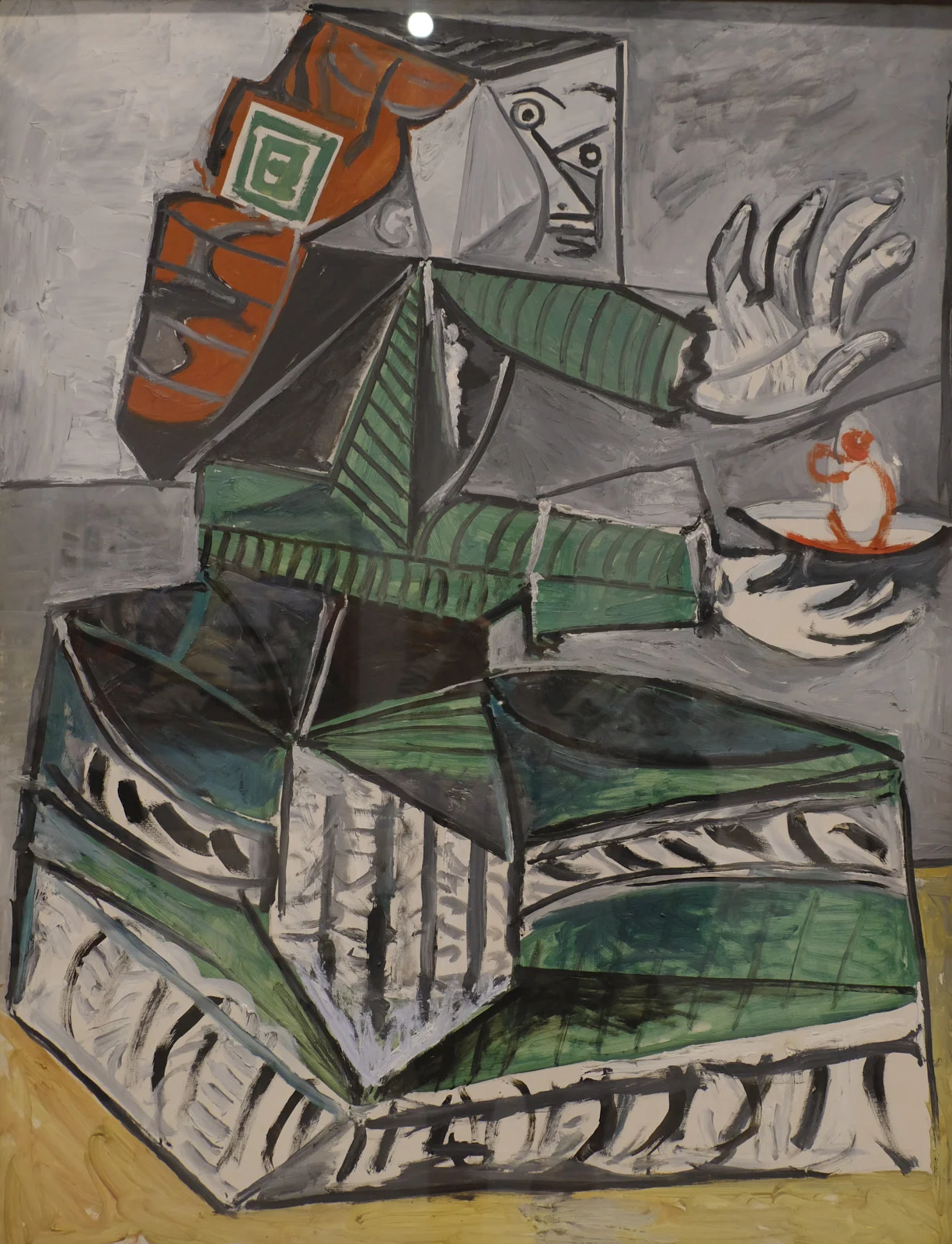 A cubist painting of a seated figure holding a small figure is in the Museu Picasso in Barcelona.
