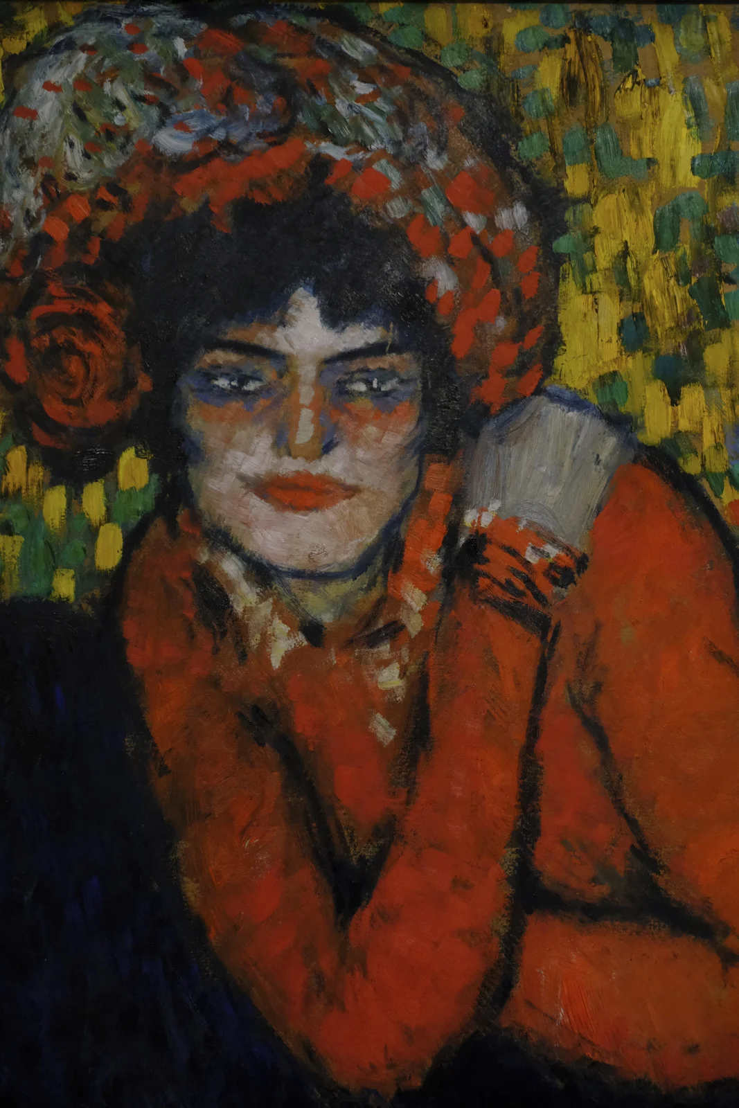 A painting of a woman wearing a floral hat is in the Museu Picasso in Barcelona.