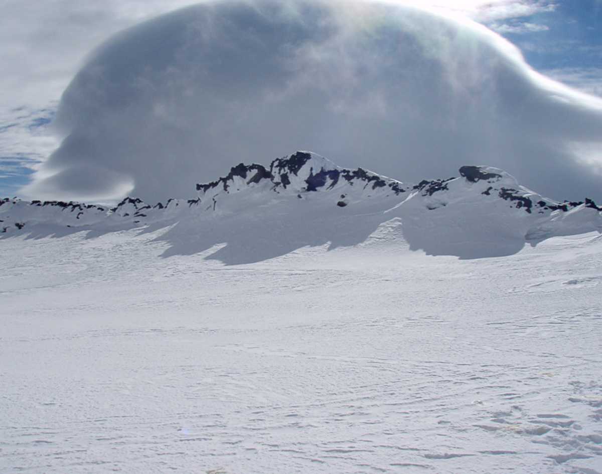 Cloud over crater rim